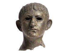 Image shows a statue head of Claudius